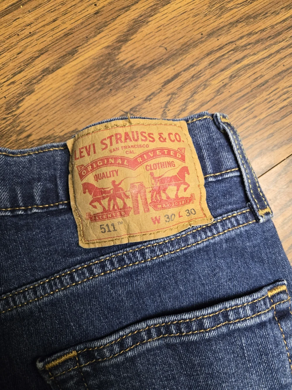 Men's Levi's Medium Blue Straight Leg Jeans.
